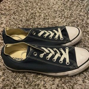 Women’s 10 and a men’s 8 converse shoes